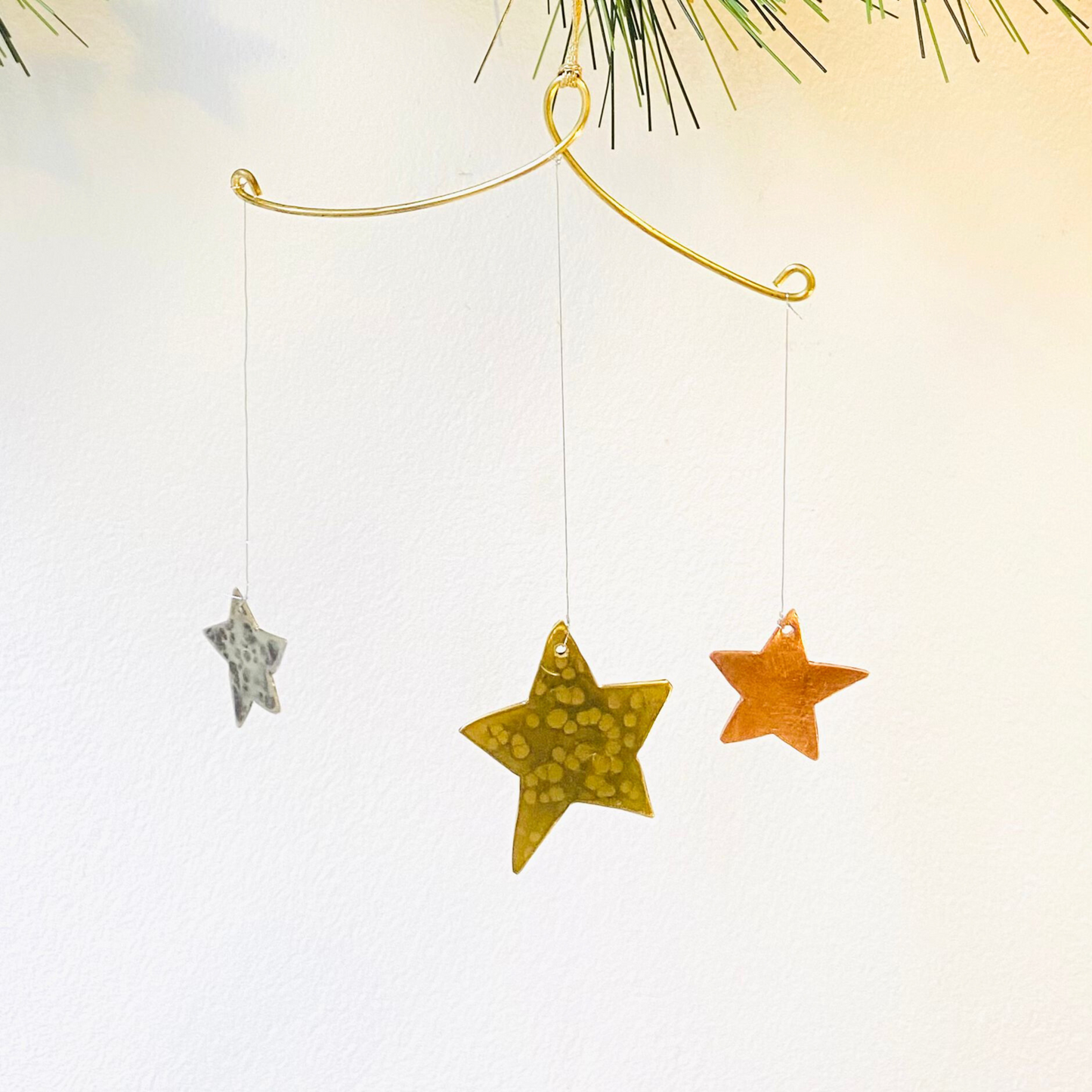 Handcrafted Lunar Metal Mobile - Brass Star with small stars in Copper and Nickel Silver